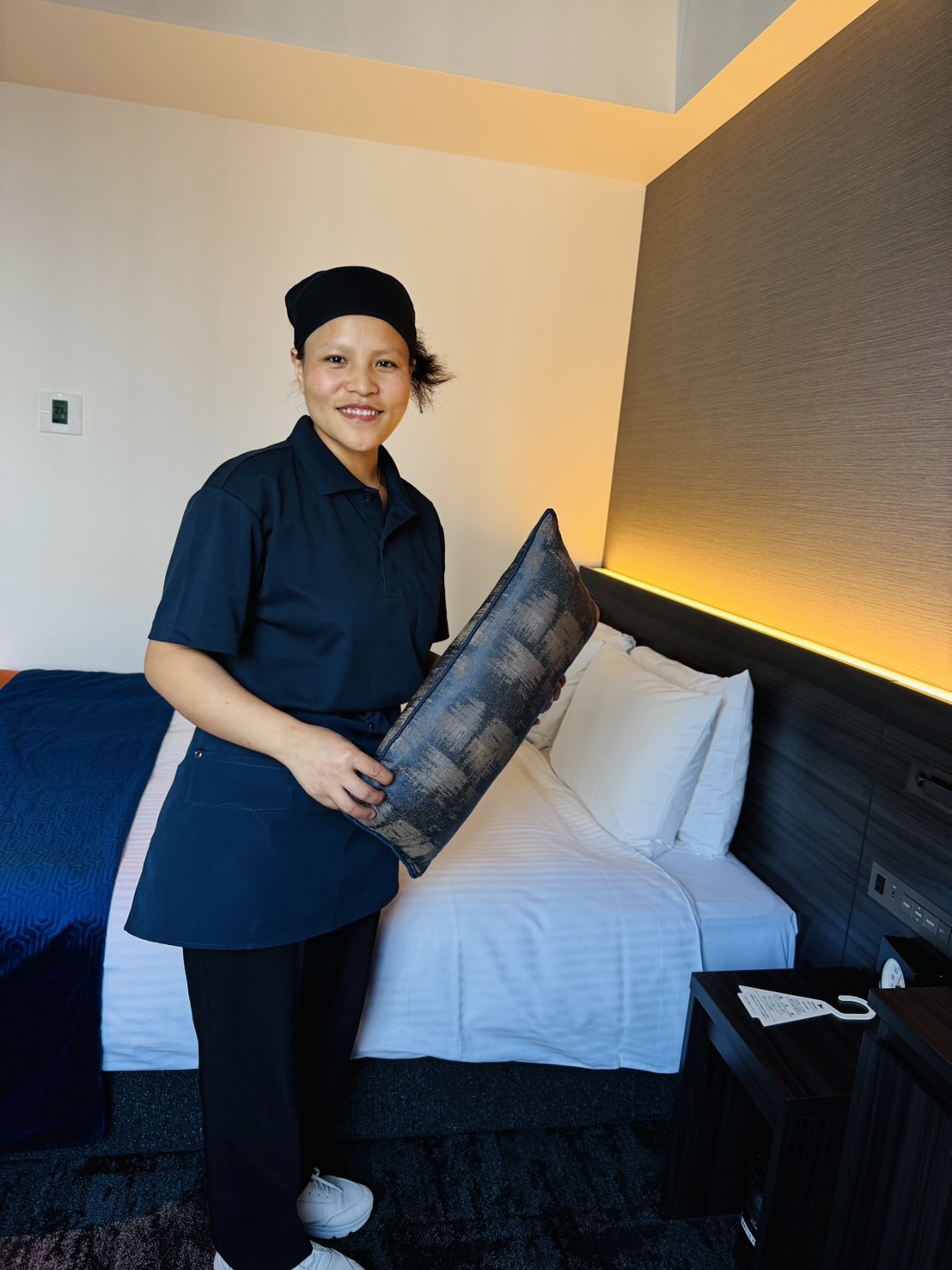 TOYAS housekeeping staff completing hotel bed making